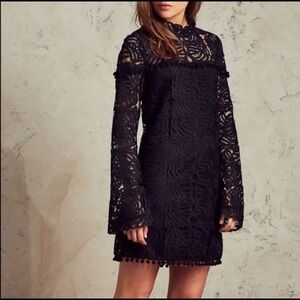 Tularosa size XS black lace pom Pom hem long sleeve lace mini dress